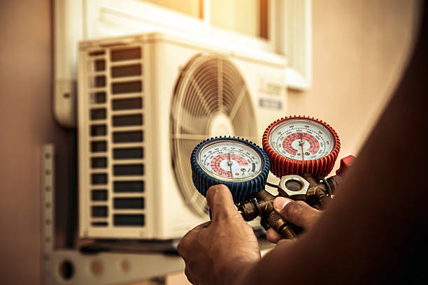 Professional Air Conditioning Service technician working in High Springs, FL